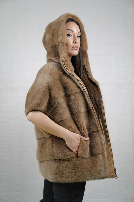 Mink fur cape brown close-up texture showing skin on skin vertical pelt flow and warm dimensional natural brown mink depth
