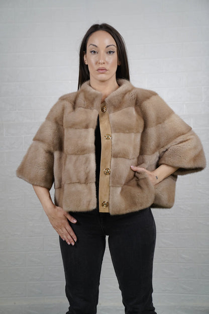 Mink fur jacket brown close-up texture showing skin on skin vertical pelt flow and rich warm brown mink depth
