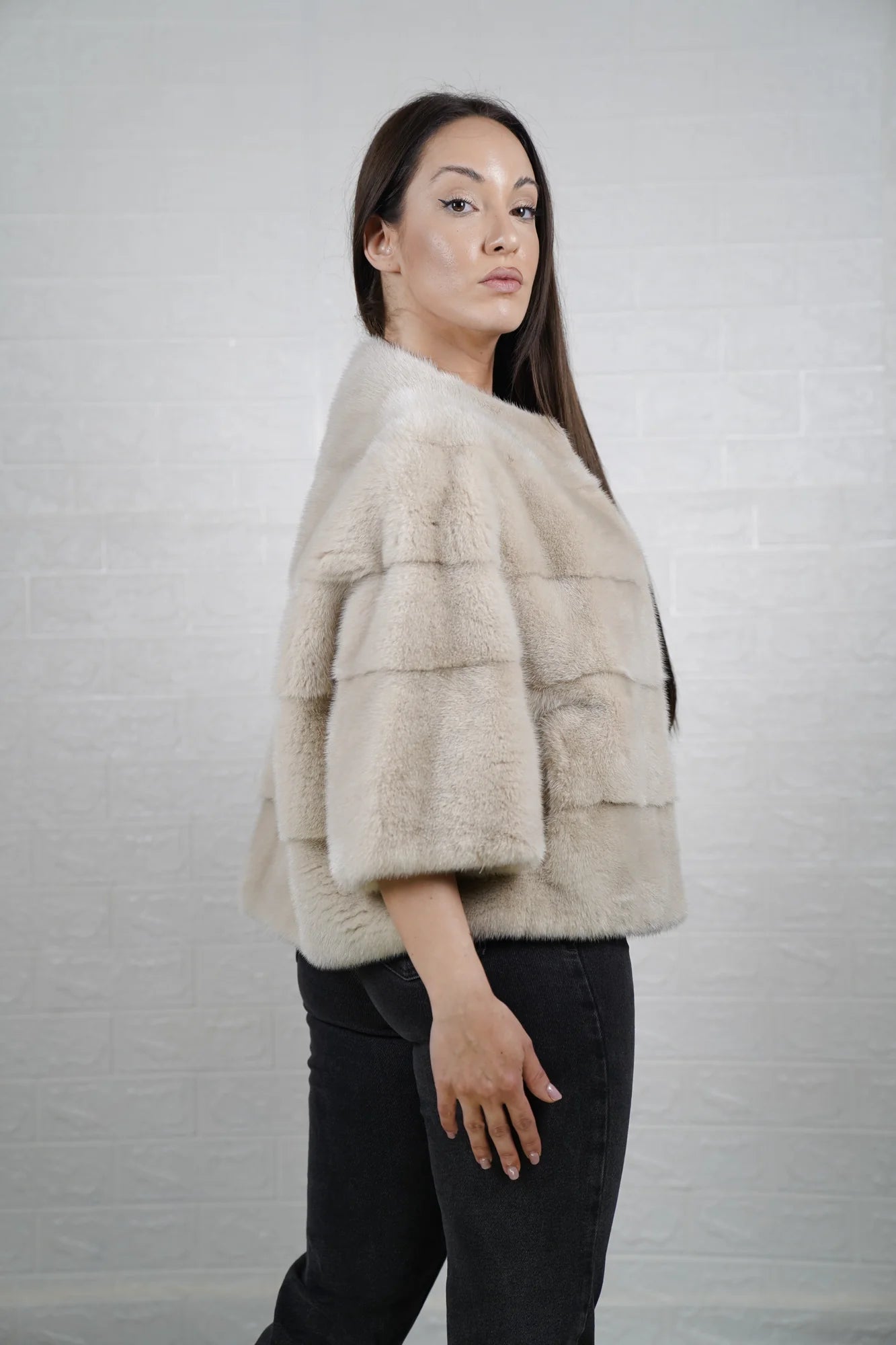 Mink fur jacket beige bomber displayed draped showing soft warm natural beige tone and clean short bomber silhouette — Greek craftsmanship, TatiFurs
