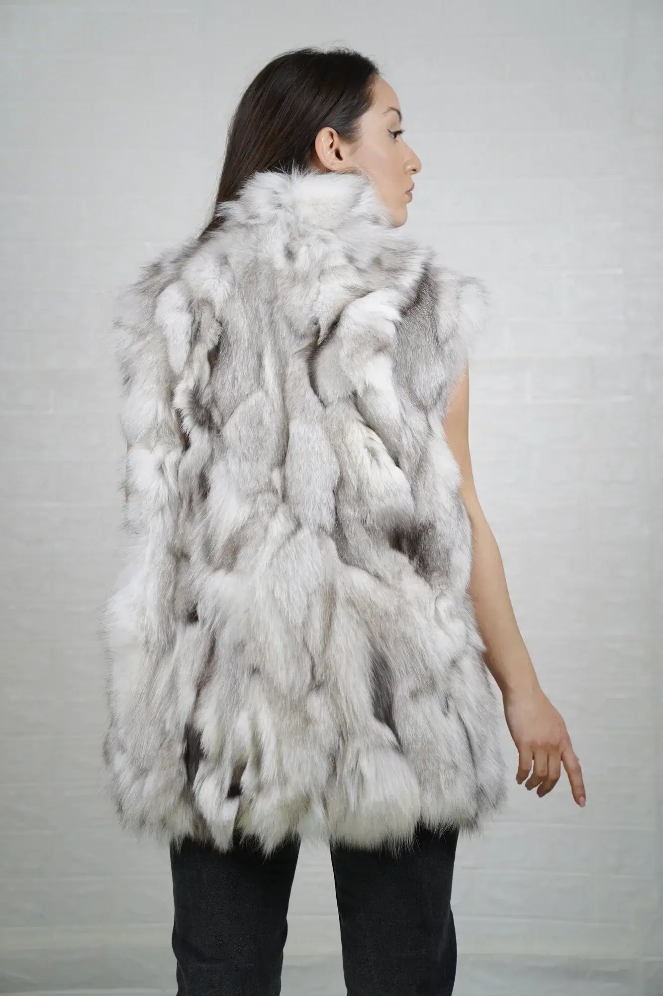 Fox fur vest blue natural shown from the back displaying full below hip silhouette and consistent cool luminous natural blue fox surface — Greek craftsmanship, TatiFurs
