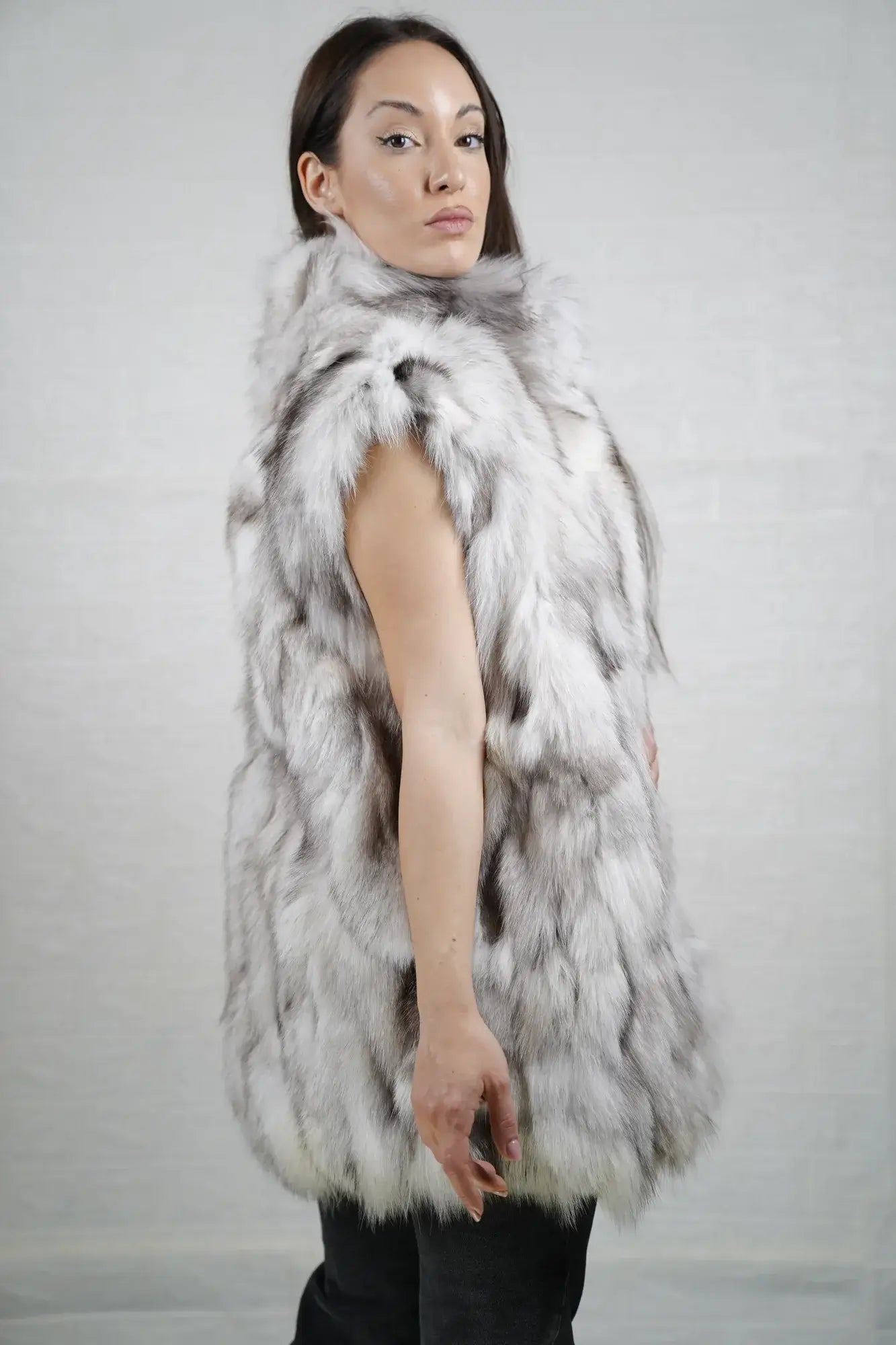 Fox fur vest blue natural women shown full length from front displaying button closure and below hip silhouette in cool luminous natural blue fox — Greek craftsmanship, TatiFurs
