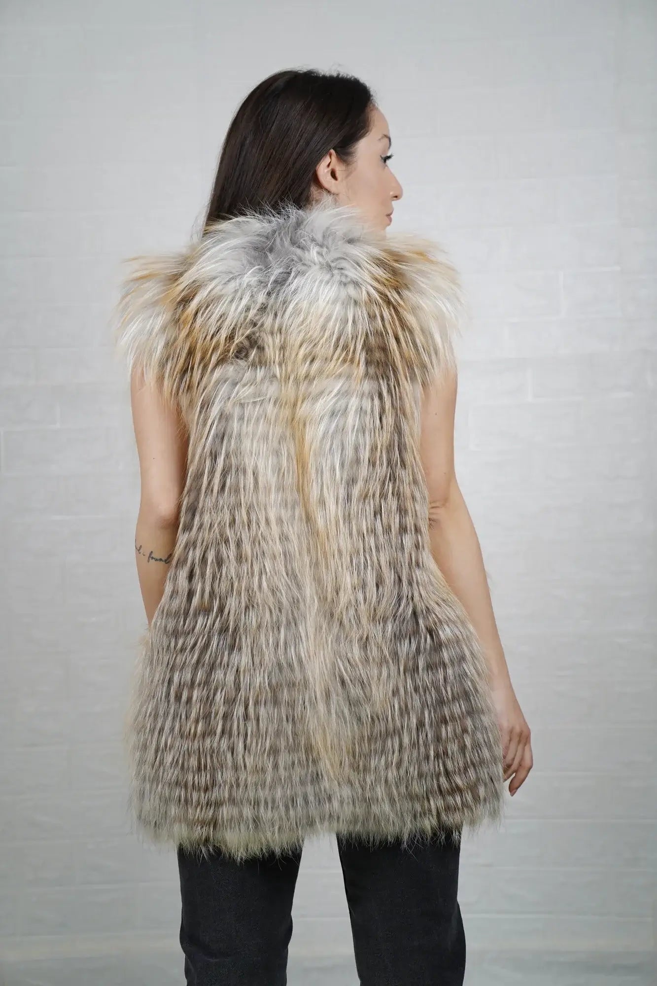 Fox fur vest golden island shown from the side displaying below hip silhouette and warm radiant golden island fox full skin natural drape — Greek craftsmanship, TatiFurs
