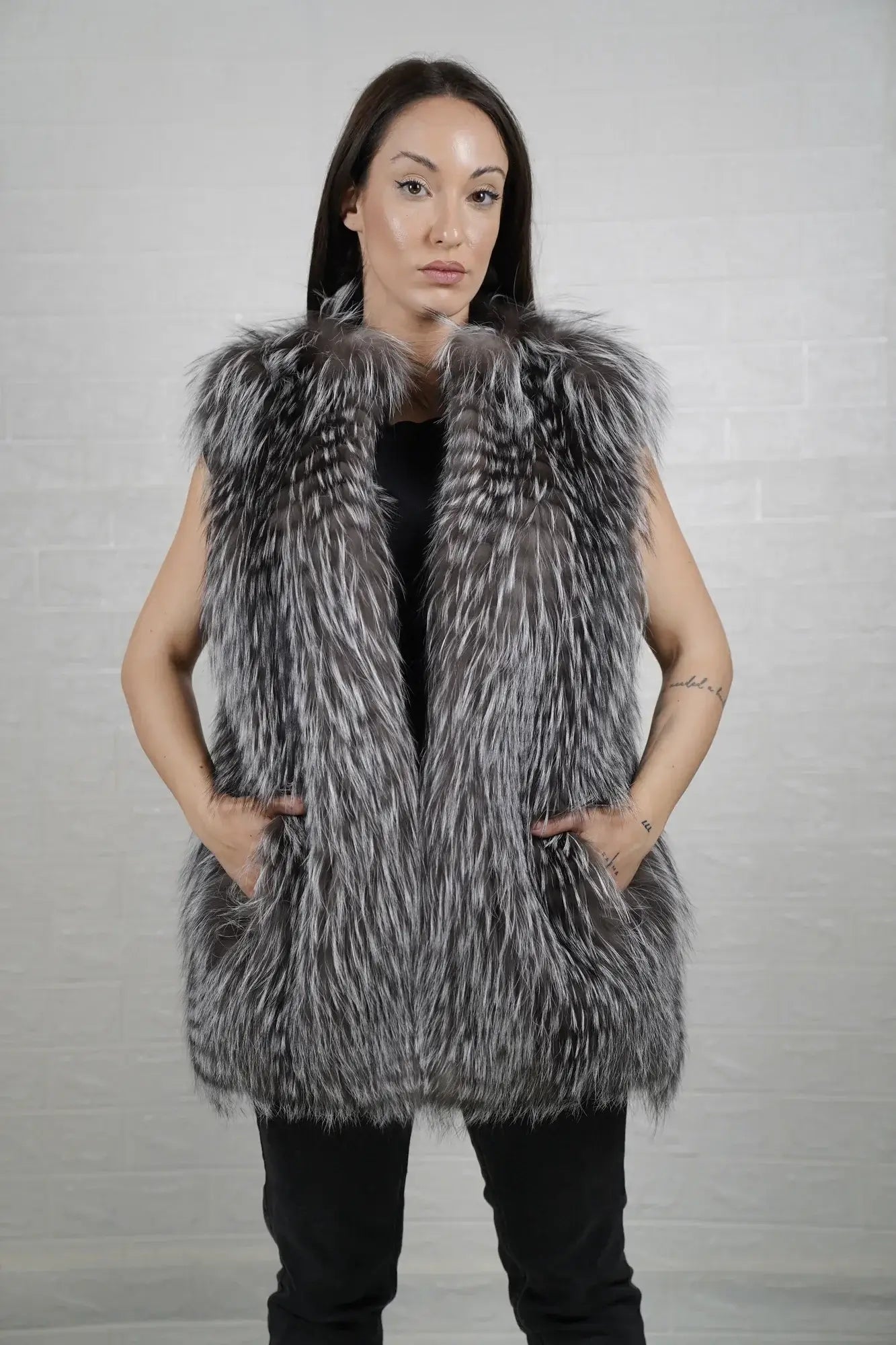 Fox fur vest silver close-up texture showing full skin silver fox long pile depth and cool luminous natural tonal shift — Greek craftsmanship, TatiFurs
