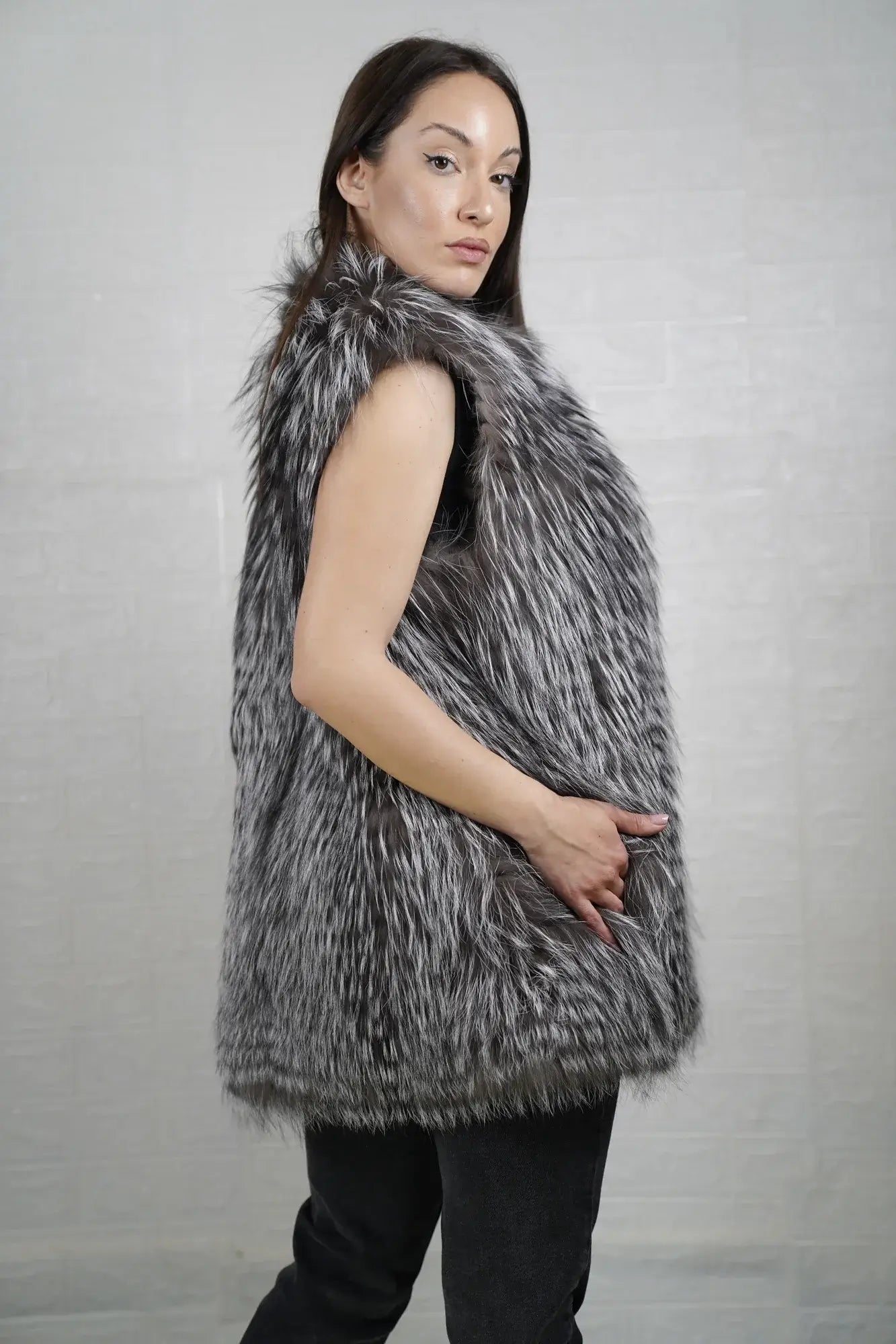 Fox fur vest silver shown from the side displaying below hip silhouette and luminous silver fox full skin natural drape — Greek craftsmanship, TatiFurs
