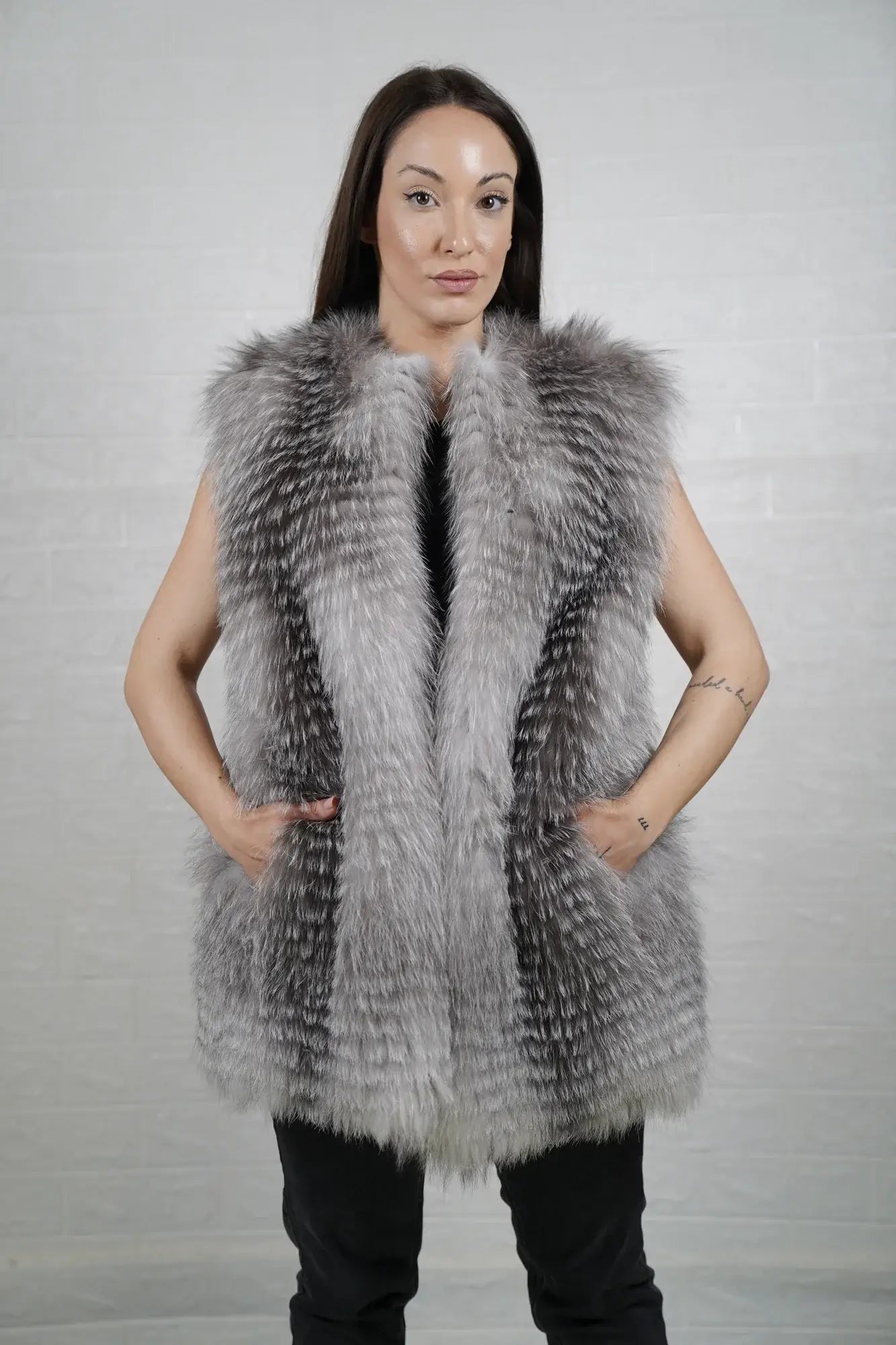 Fox fur vest natural frost shown from the side displaying below hip silhouette and cool atmospheric natural frost fox full skin natural drape — Greek craftsmanship, TatiFurs
