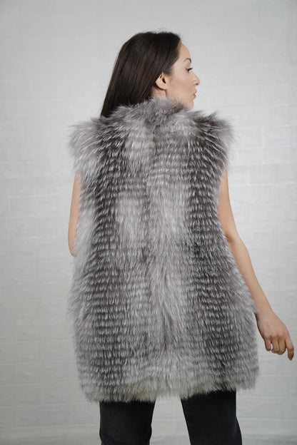 Fox fur vest natural frost women shown full length from front displaying button closure and below hip silhouette in cool gray silver natural frost fox — Greek craftsmanship, TatiFurs
