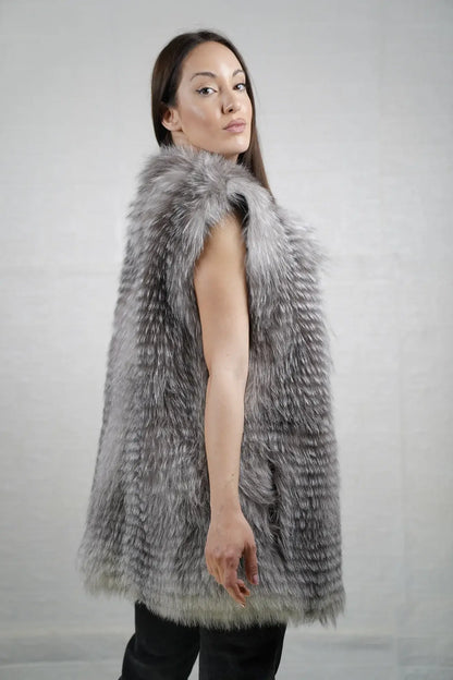 Fox fur vest natural frost close-up texture showing full skin natural frost fox long pile depth and cool gray silver atmospheric tonal variation — Greek craftsmanship, TatiFurs
