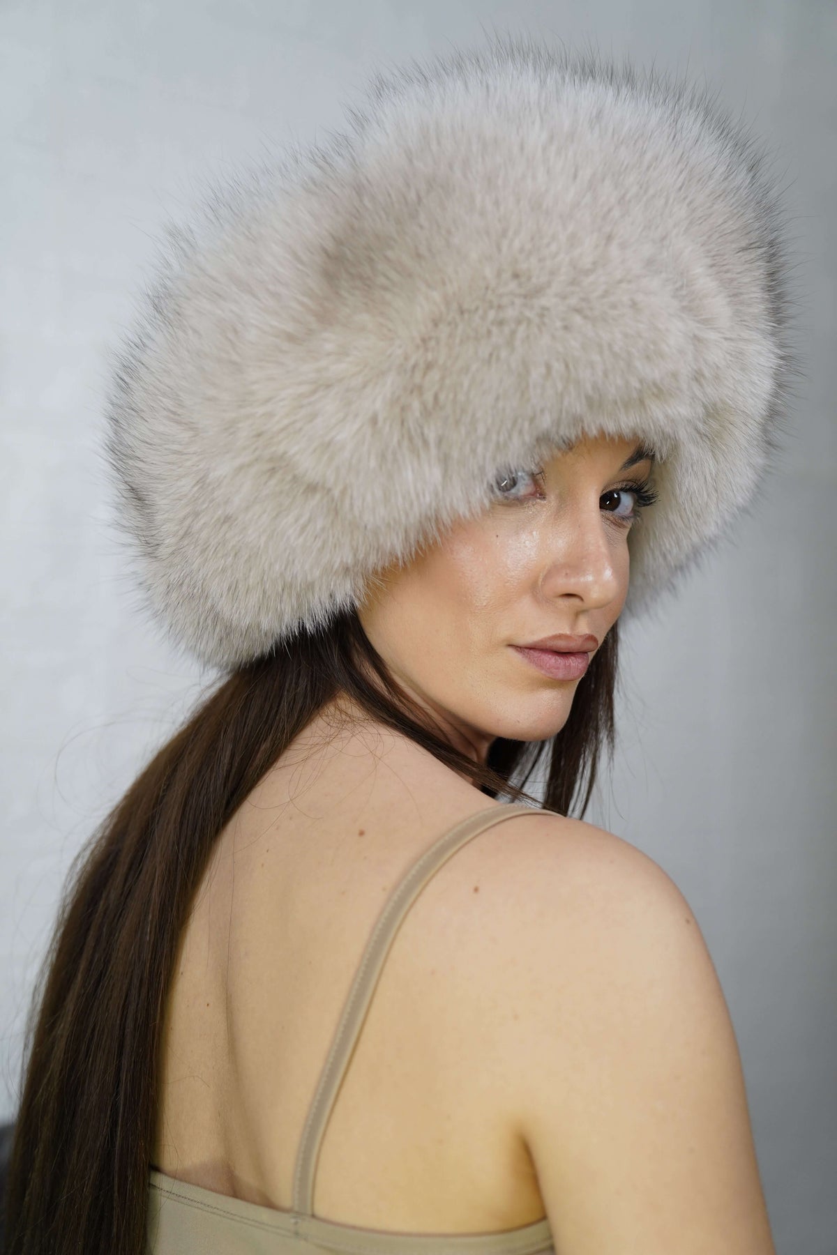 Fox Fur Headband Beige — Full Skin, Elastic shown from the side displaying the plush creamy light beige fur band over the ears — Greek craftsmanship, TatiFurs