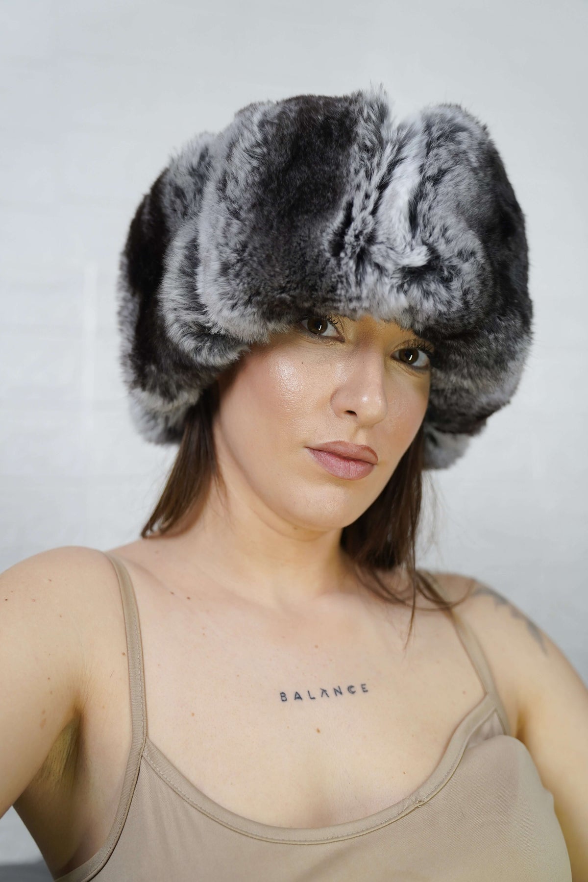 Rex Rabbit Fur Headband Chinchilla — Full Skin, Elastic — front view worn by a woman, TatiFurs