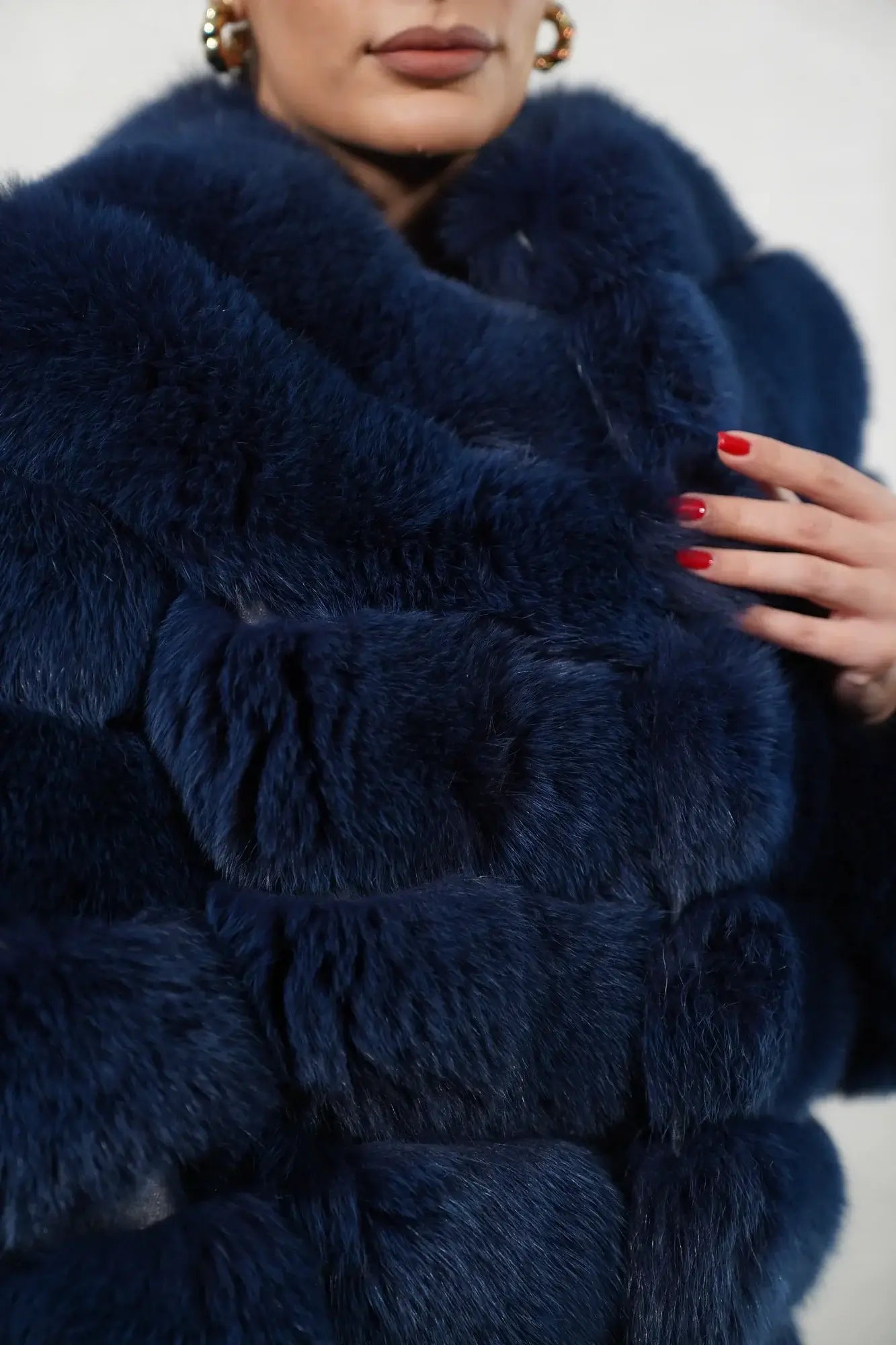 Fox fur jacket blue women shown full length from front displaying horizontal leather trim rows and hip level blue fox silhouette — Greek craftsmanship, TatiFurs
