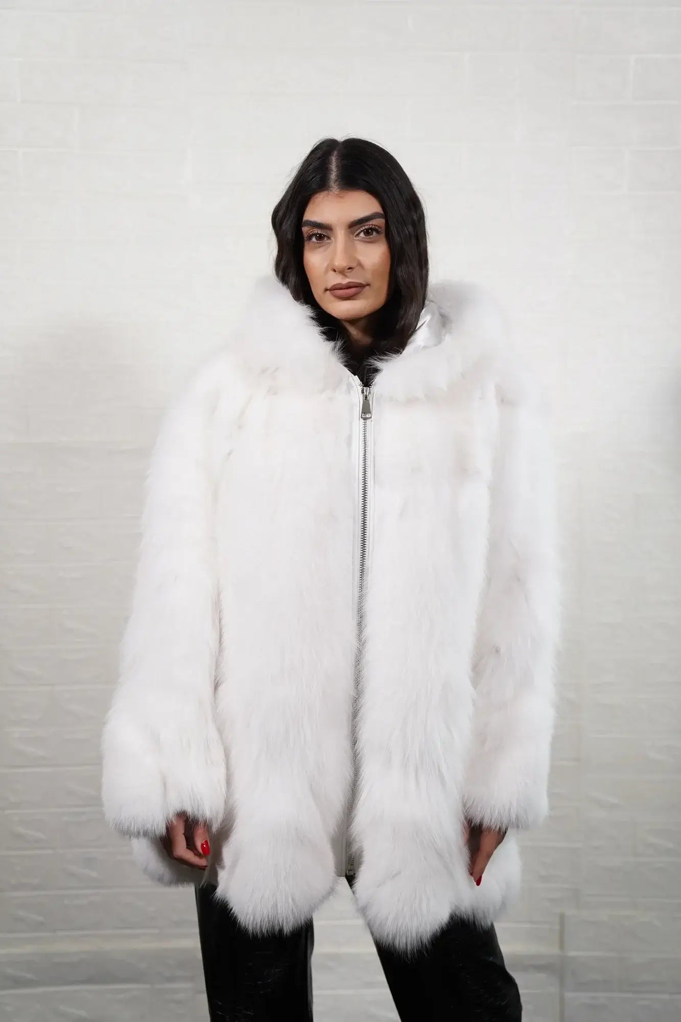 Fox fur coat white shown from the side displaying above knee silhouette and uniform luminous white fox solid pattern surface — Greek craftsmanship, TatiFurs
