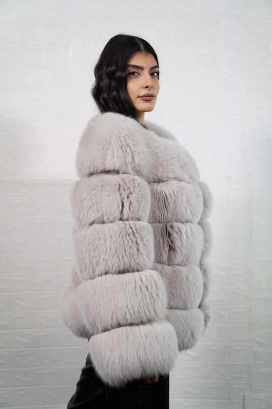 Gray fox fur jacket displaying full skin gray fox horizontal rows with rabbit fur trim strips and collarless bomber hip level silhouette — Greek craftsmanship, TatiFurs
