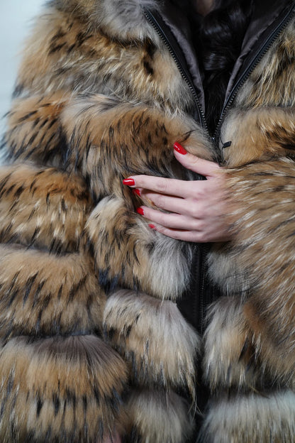 Finn raccoon fur jacket natural hood worn up showing velvet lined hood interior framing face against dramatic natural Finnish raccoon leather trim exterior — Greek craftsmanship, TatiFurs
