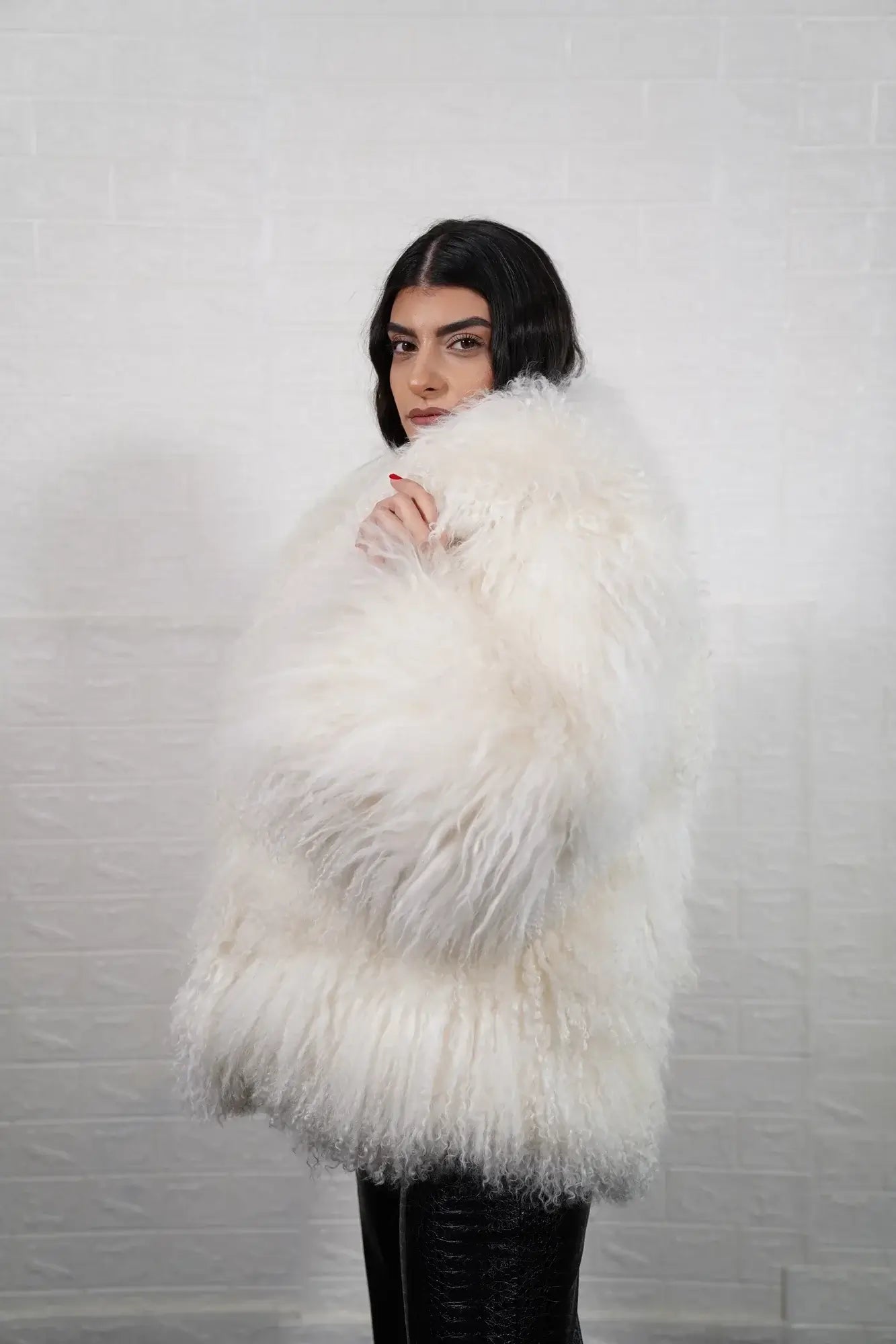 Mongolian jacket white shown from the back displaying full hip level silhouette and consistent pure white Mongolian sheepskin surface — Greek craftsmanship, TatiFurs
