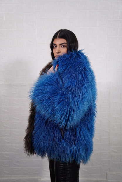 Mongolian jacket dark brown blue shown from the side displaying hip level silhouette and deep chocolate brown with vivid cobalt blue long curly Mongolian wool — Greek craftsmanship, TatiFurs