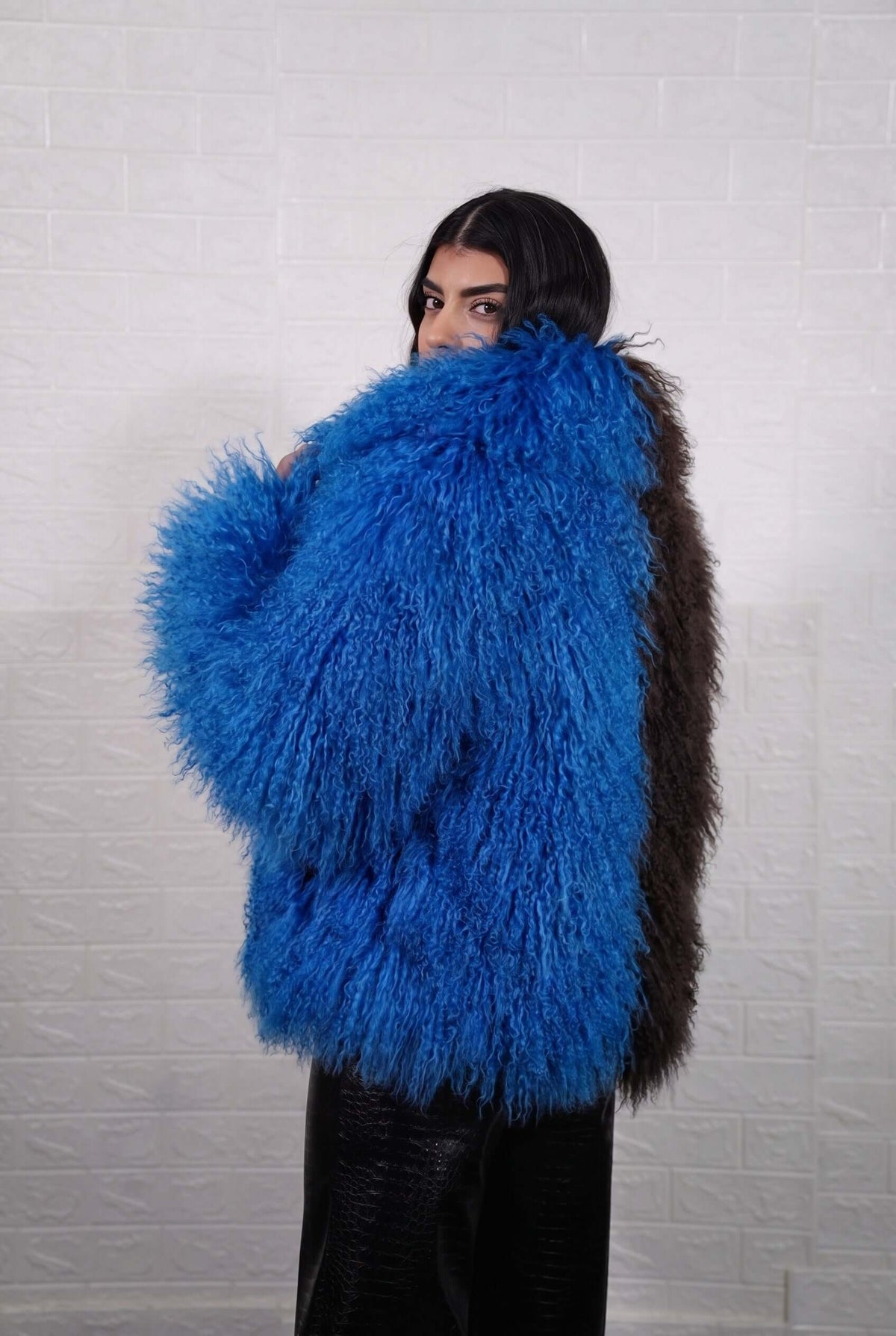 Mongolian jacket dark brown blue shown from the back displaying full hip level silhouette and consistent deep chocolate brown with vivid cobalt blue curly wool surface — Greek craftsmanship, TatiFurs