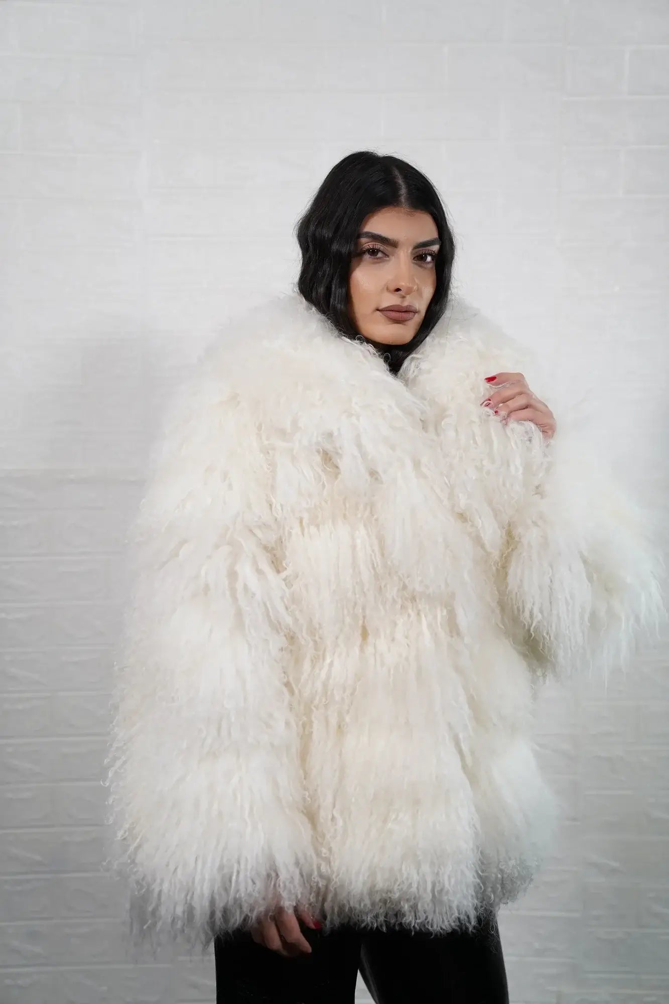 Mongolian jacket white close-up texture showing white sheepskin leather exterior and natural wool lining quality — Greek craftsmanship, TatiFurs
