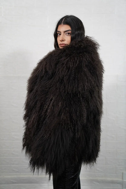 Mongolian jacket brown displaying deep warm brown sheepskin leather exterior and hip level collar silhouette — Greek craftsmanship, TatiFurs
