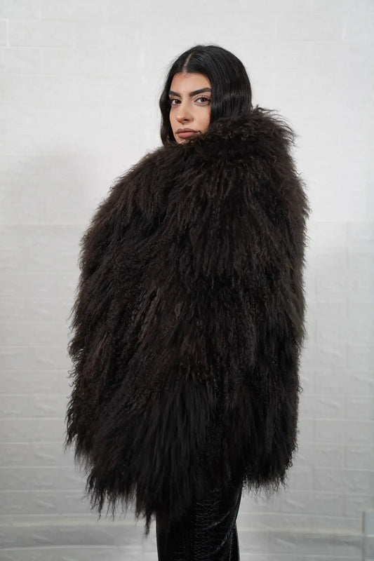 Mongolian jacket brown displaying deep warm brown sheepskin leather exterior and hip level collar silhouette — Greek craftsmanship, TatiFurs
