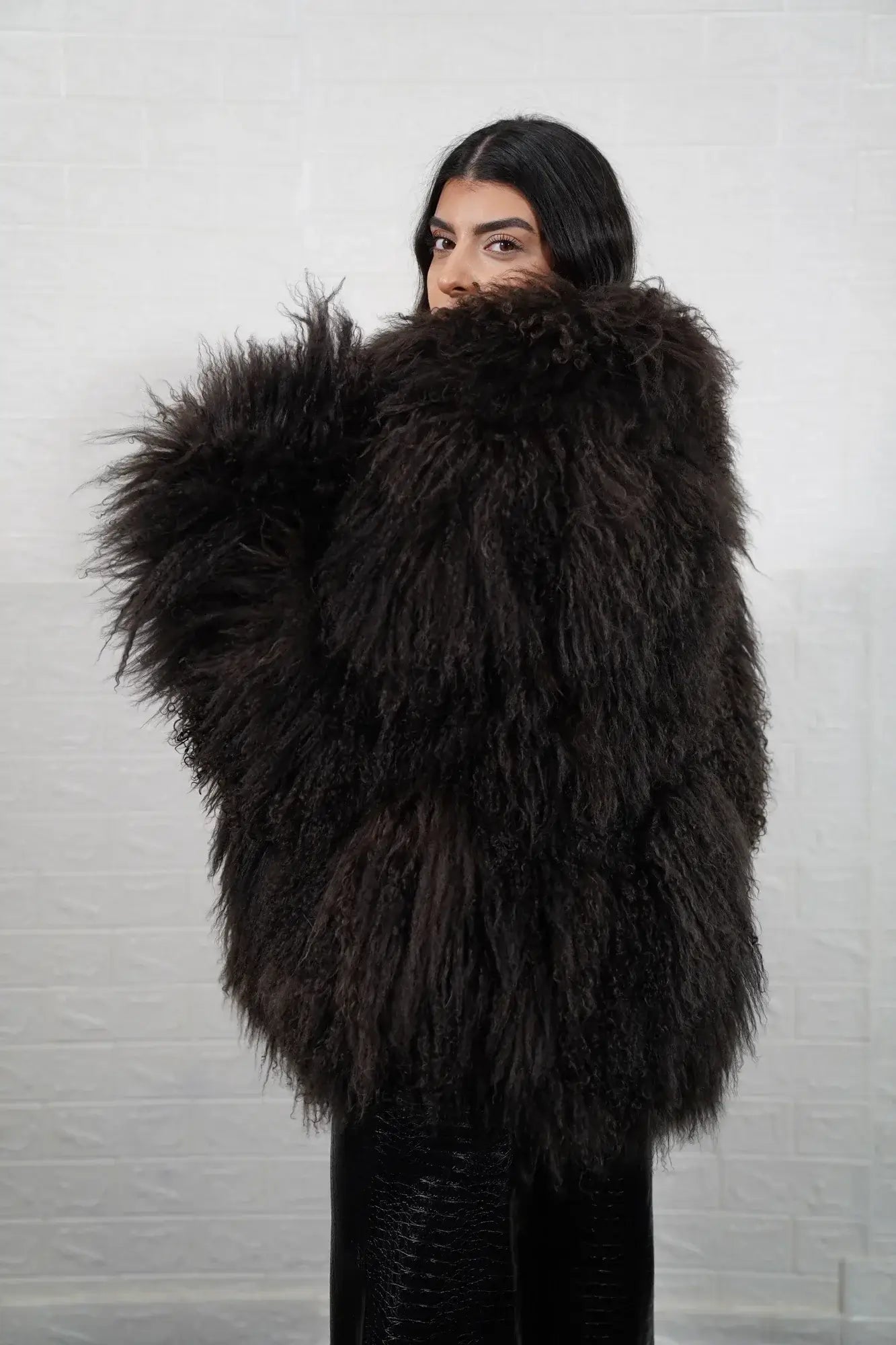 Mongolian jacket brown shown from the back displaying full hip level silhouette and consistent warm brown Mongolian sheepskin surface — Greek craftsmanship, TatiFurs
