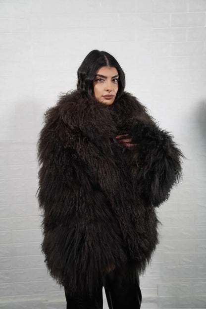 Mongolian jacket brown collar close-up showing precise skin matching between collar and shoulder in deep warm brown Mongolian wool sheepskin — Greek craftsmanship, TatiFurs
