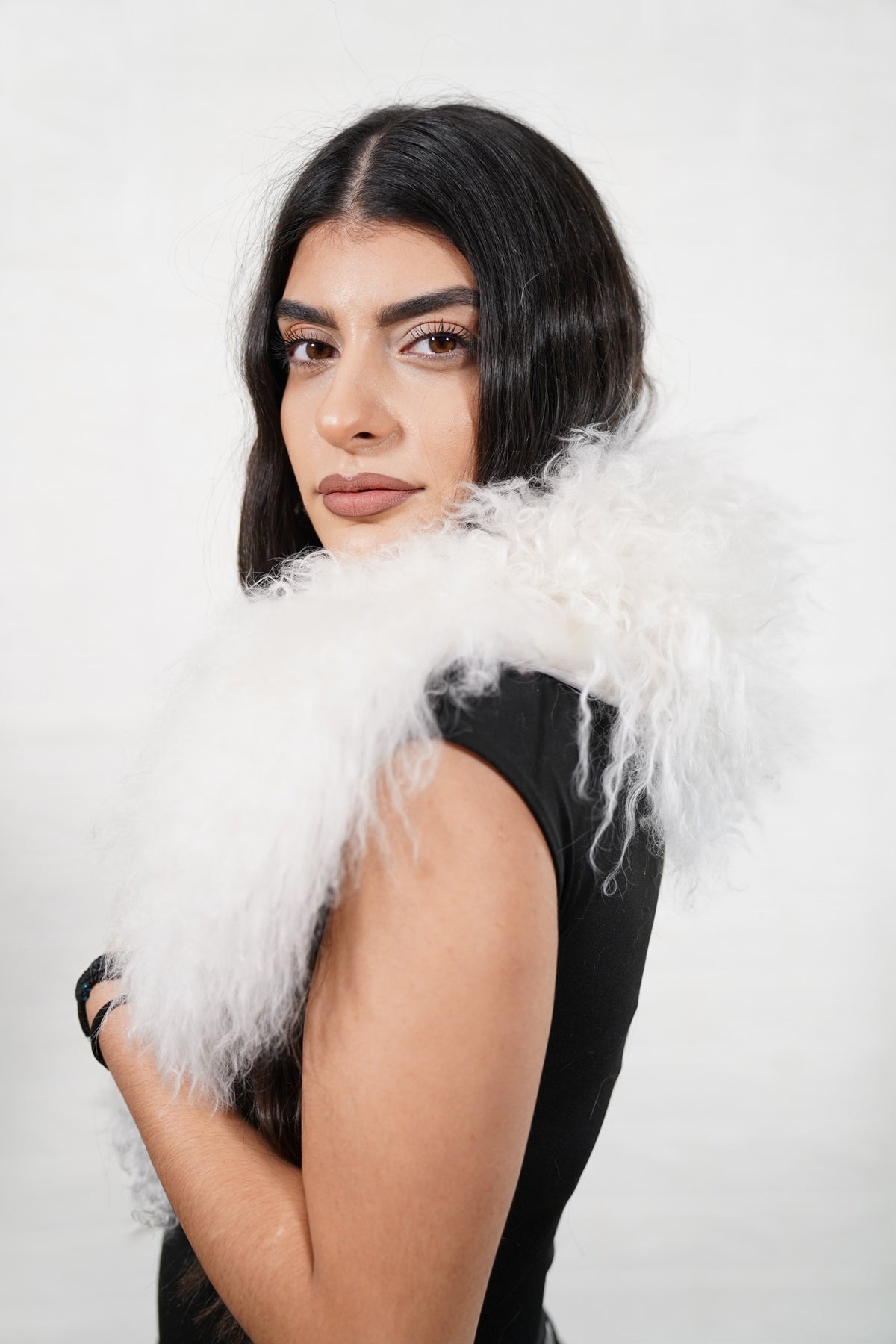Mongolian Sheepskin Collar White — Curly Lamb Fur three-quarter view over the shoulder, volume of the pure snow white Mongolian lamb curls around the neck — handmade in Greece, TatiFurs