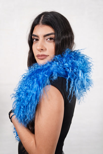 Mongolian Sheepskin Collar Blue — Curly Lamb Fur three-quarter view over the shoulder, volume of the rich cobalt blue Mongolian lamb curls around the neck — handmade in Greece, TatiFurs