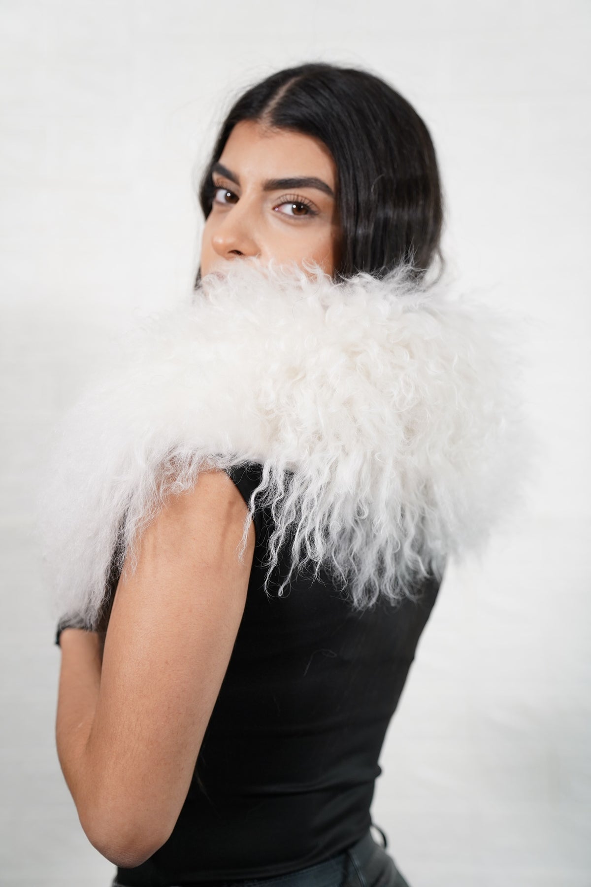 Mongolian Sheepskin Collar White — Curly Lamb Fur seen from behind, pure snow white curly sheepskin wrapped high around the neck and shoulders — TatiFurs