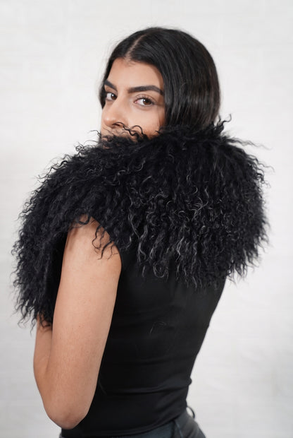 Mongolian Sheepskin Collar Black — Curly Lamb Fur seen from behind, deep jet black curly sheepskin wrapped high around the neck and shoulders — TatiFurs