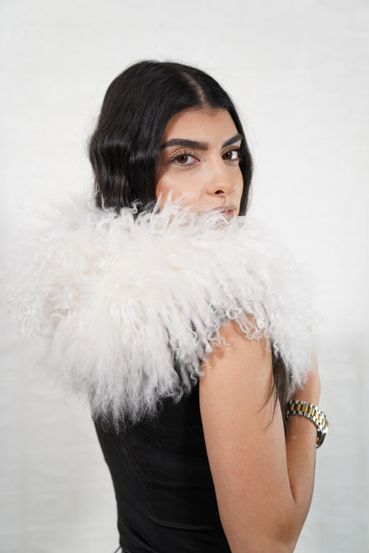 Mongolian Sheepskin Collar White — Curly Lamb Fur side view showing the length of the pure snow white Mongolian sheepskin collar over the shoulder — Greek craftsmanship, TatiFurs