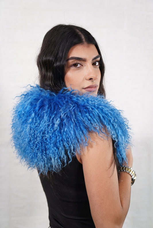 Mongolian Sheepskin Collar Blue — Curly Lamb Fur side view showing the length of the rich cobalt blue Mongolian sheepskin collar over the shoulder — Greek craftsmanship, TatiFurs