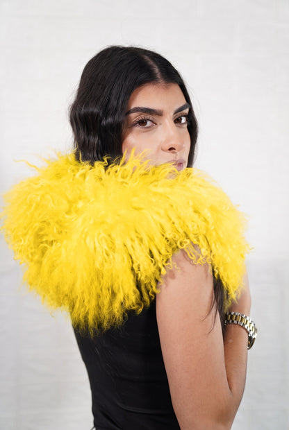 Mongolian Sheepskin Collar Yellow — Curly Lamb Fur side view showing the length of the warm sunflower yellow Mongolian sheepskin collar over the shoulder — Greek craftsmanship, TatiFurs