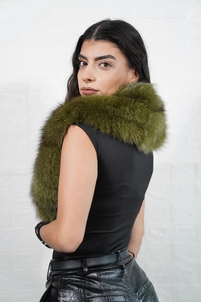 Fox fur collar green worn as scarf showing full skin green fox fur wrapped and draped with natural forest depth — Greek craftsmanship, TatiFurs
