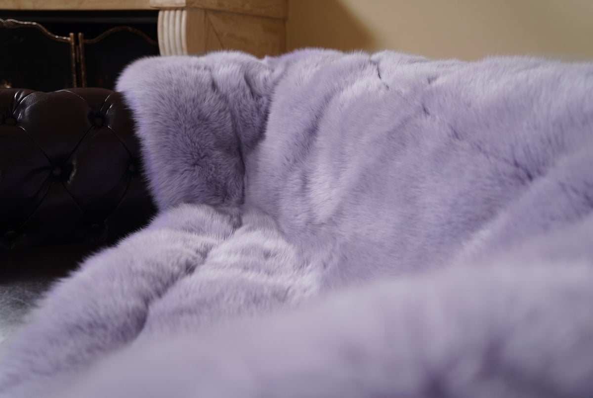 Fox Fur Blanket Throw Lavender Purple — Full Skin Saga Furs close-up of the dense soft lavender purple fox fur texture at the edge of the armchair — Saga Furs quality, TatiFurs