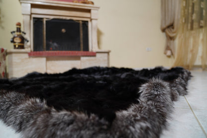 fox fur blanket throw double sided black silver borders — laid flat on the floor as a fur rug, silver fox border on every edge — TatiFurs