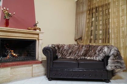 fox fur blanket throw crystal natural striped — laid across the back of the leather sofa as a long throw — TatiFurs