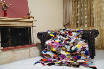 fox fur blanket throw double sided colorful — draped over the Chesterfield sofa, every colour of fox fur in one blanket — TatiFurs
