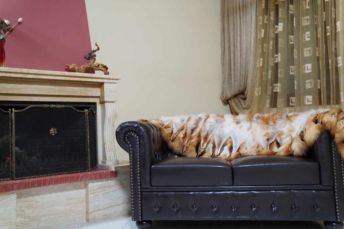 fox fur blanket throw double sided red canadian striped — laid across the back of the leather sofa as a long throw — TatiFurs