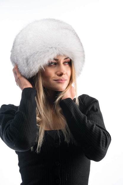 Model wearing Fox Fur Hat Natural Blue - Tatifurs, showcasing its luxurious and soft texture.