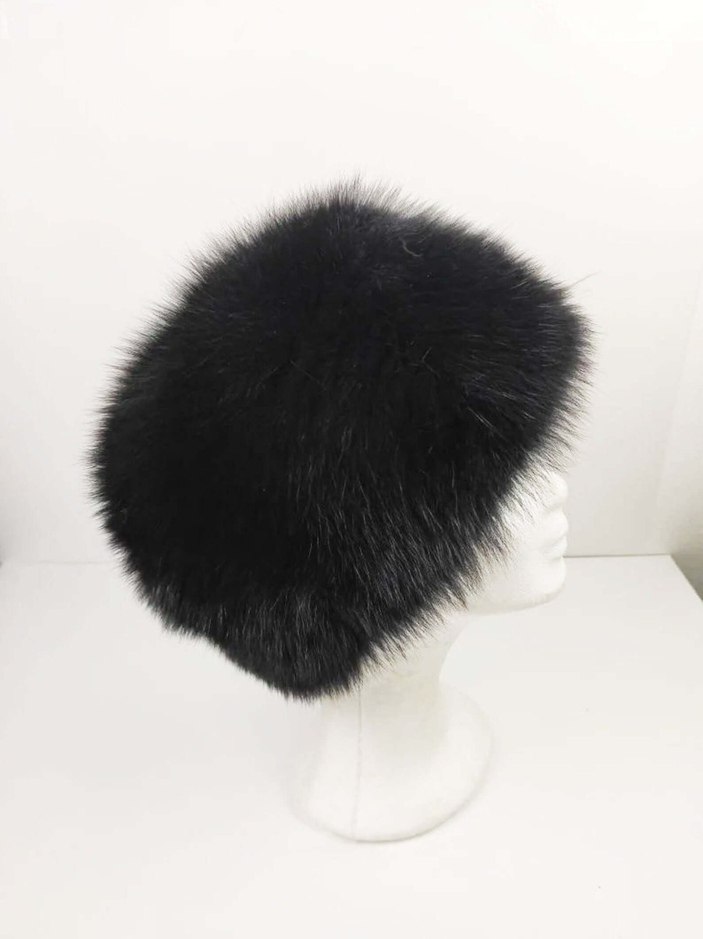 Fox Fur Hat Black - Tatifurs displayed elegantly on a mannequin, showcasing its luxurious black fox fur design.