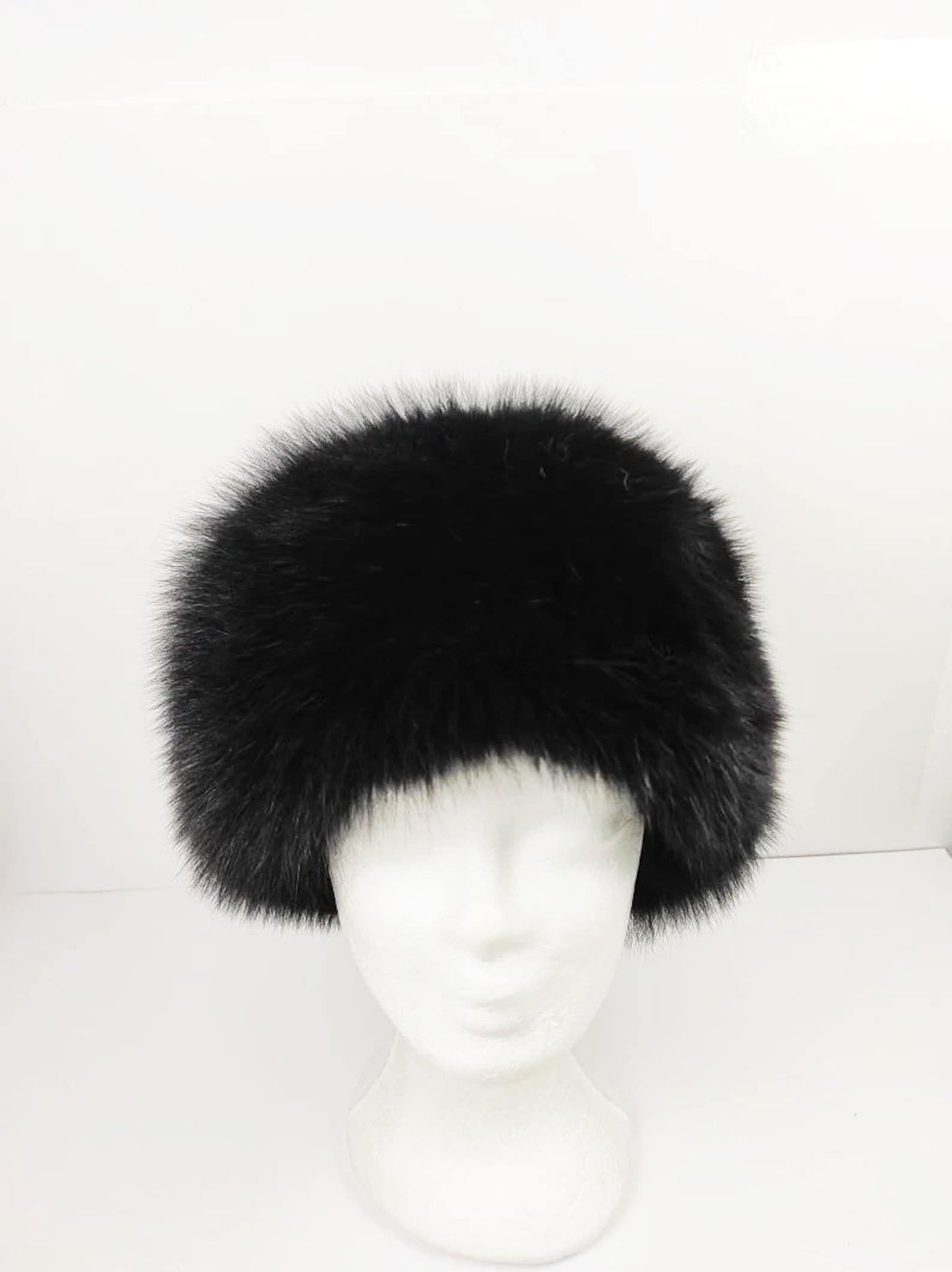 Fox Fur Hat Black - Tatifurs displayed on a mannequin, showcasing its luxurious black fur and chic design.