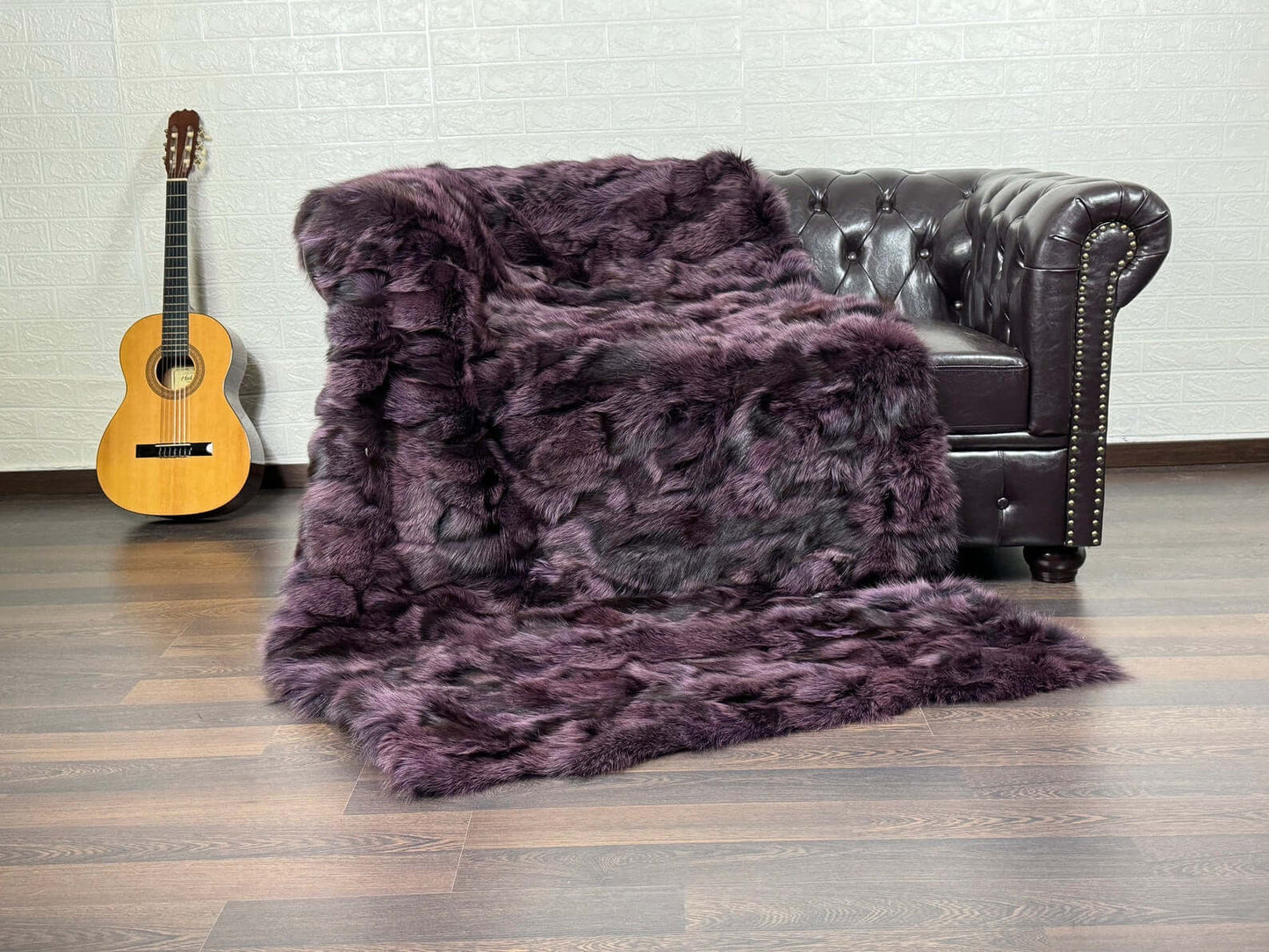Purple with black details fox fur throw blanket laid flat showing full design and vivid colour balance throughout
