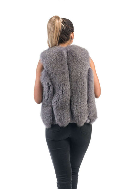 Gray Fox Fur Vest Full Skin - Tatifurs worn by a model from the back, showcasing its luxurious softness and elegant design.