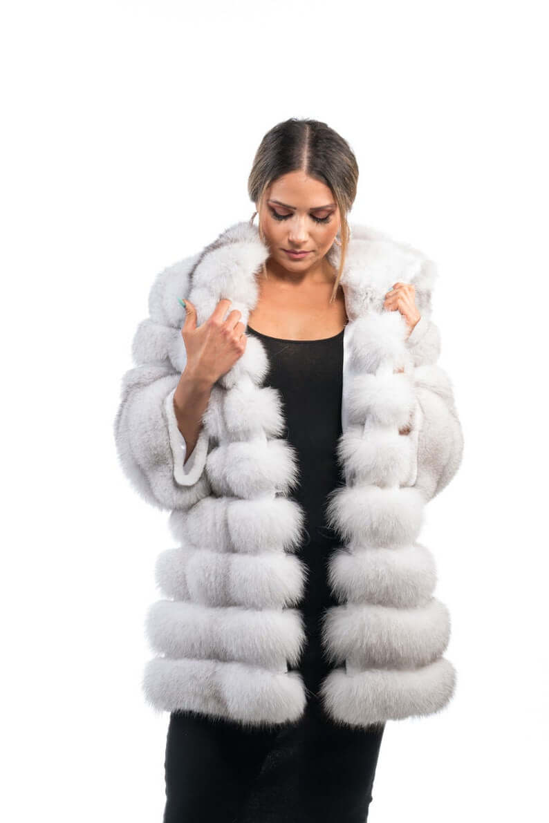 Fox fur coat blue natural rabbit trim close-up showing horizontal rabbit fur strips between full skin natural blue fox rows across coat width — Greek craftsmanship, TatiFurs
