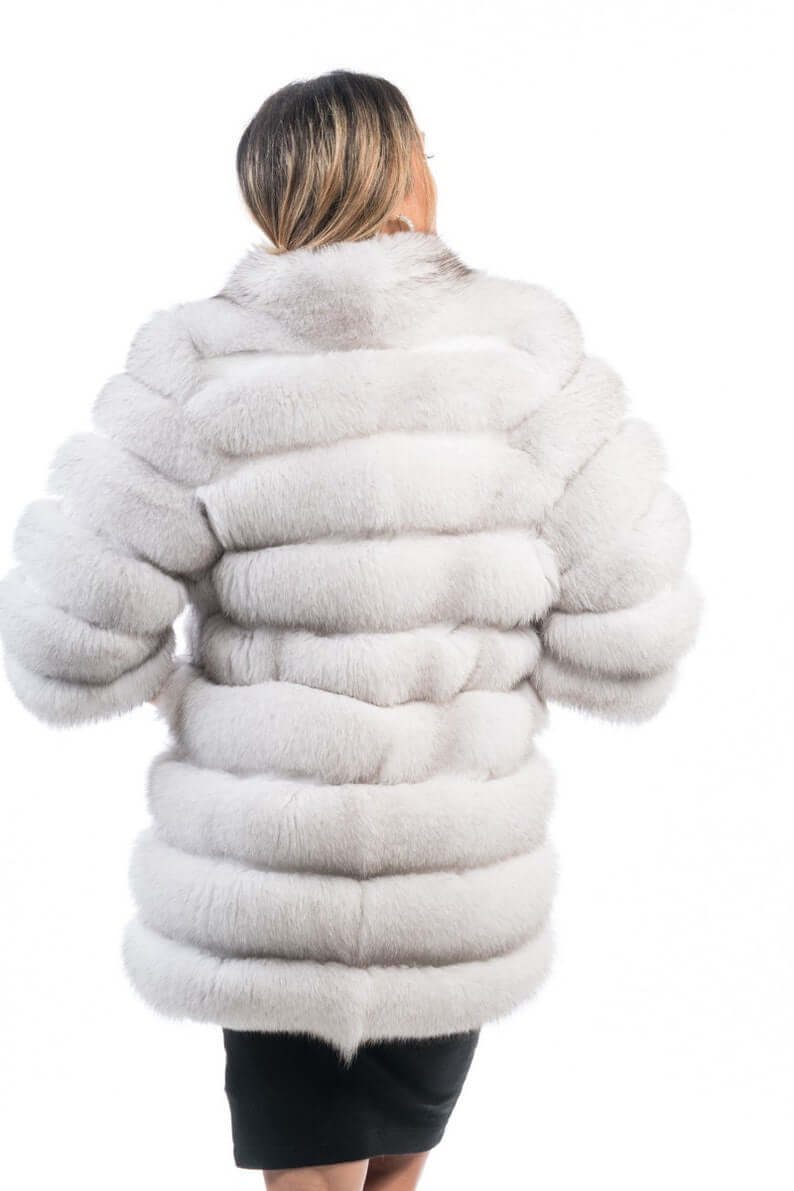 Fox fur coat blue natural shown from the back displaying full above knee silhouette and horizontal rabbit trim construction across natural blue fox rows — Greek craftsmanship, TatiFurs
