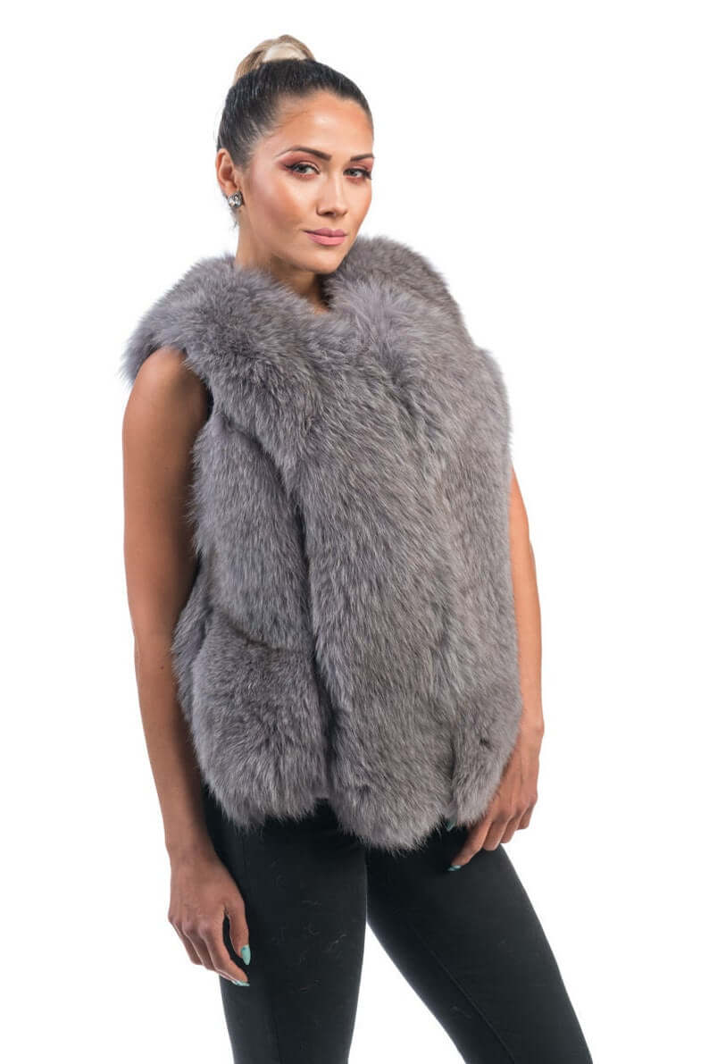 Gray Fox Fur Vest Full Skin - Tatifurs worn by a model, showcasing its luxurious design and soft texture.