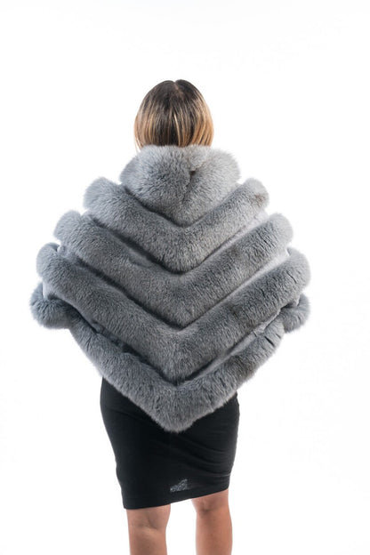 Fox fur poncho gray women shown full length from front fox side displaying zipper closure and hip level diagonal gray fox poncho silhouette — Greek craftsmanship, TatiFurs

