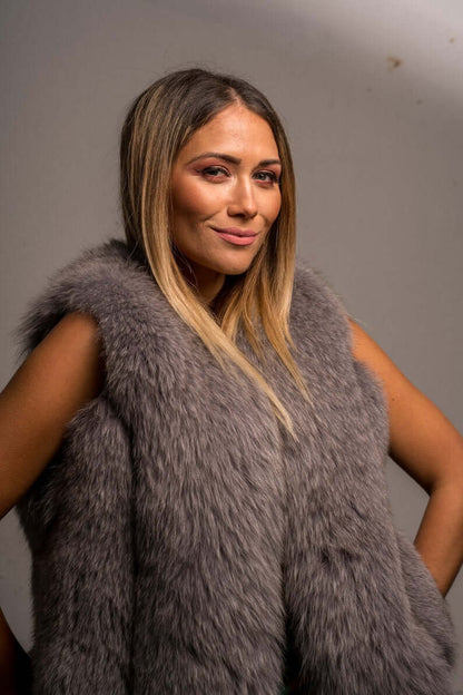 Gray Fox Fur Vest Full Skin - Tatifurs worn by a model, showcasing its luxurious and elegant design.