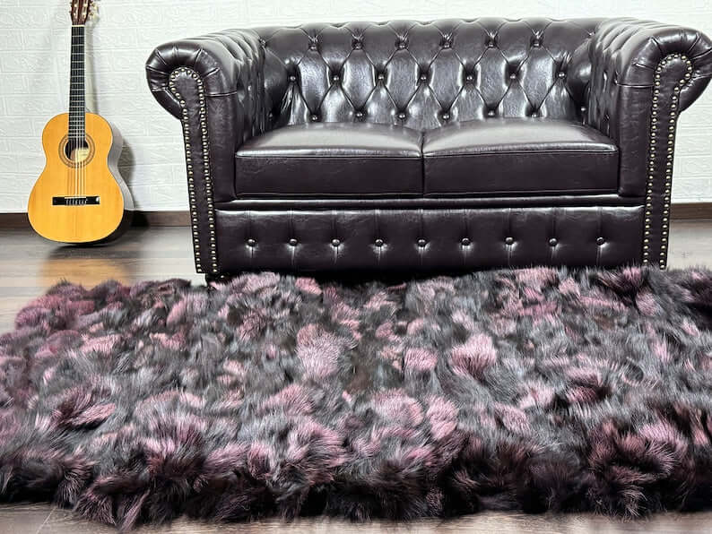 Fox Fur Blanket Throw Black Purple - Tatifurs displayed on a plush rug in a cozy living room setting.