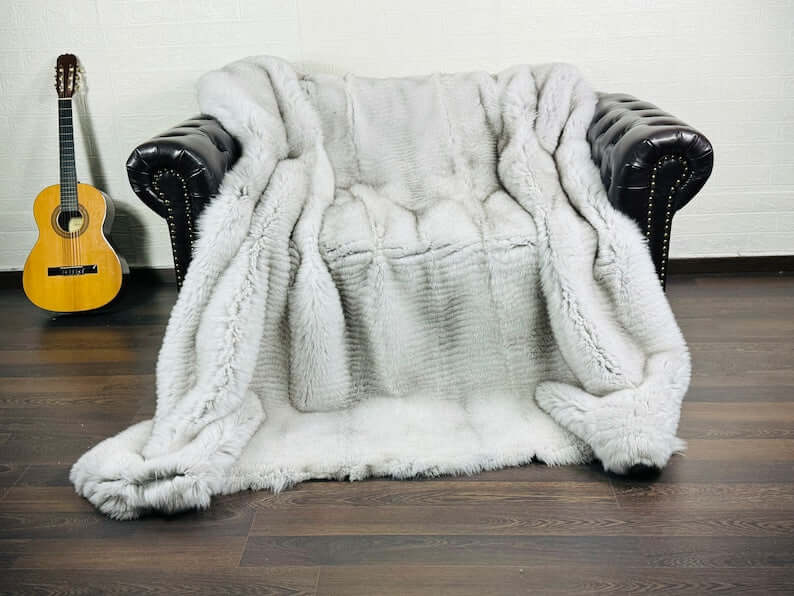 Natural blue fox fur full skin throw blanket showing premium velvet cotton backing detail
